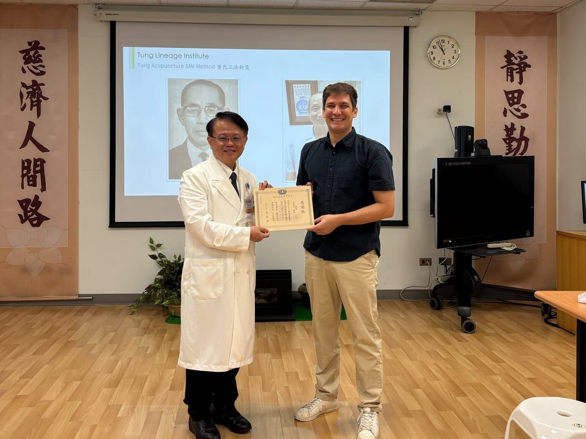 Nicolas Berger and Dr Wu Hsien-chang, director of the department of Chinese medicine at Taipei Tzu Chi Hospital.